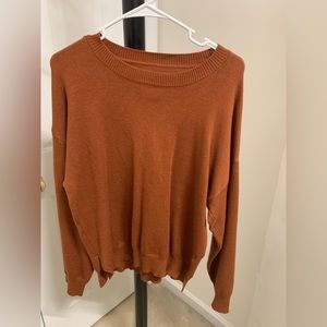 Burnt orange, bat-swing sleeve sweater